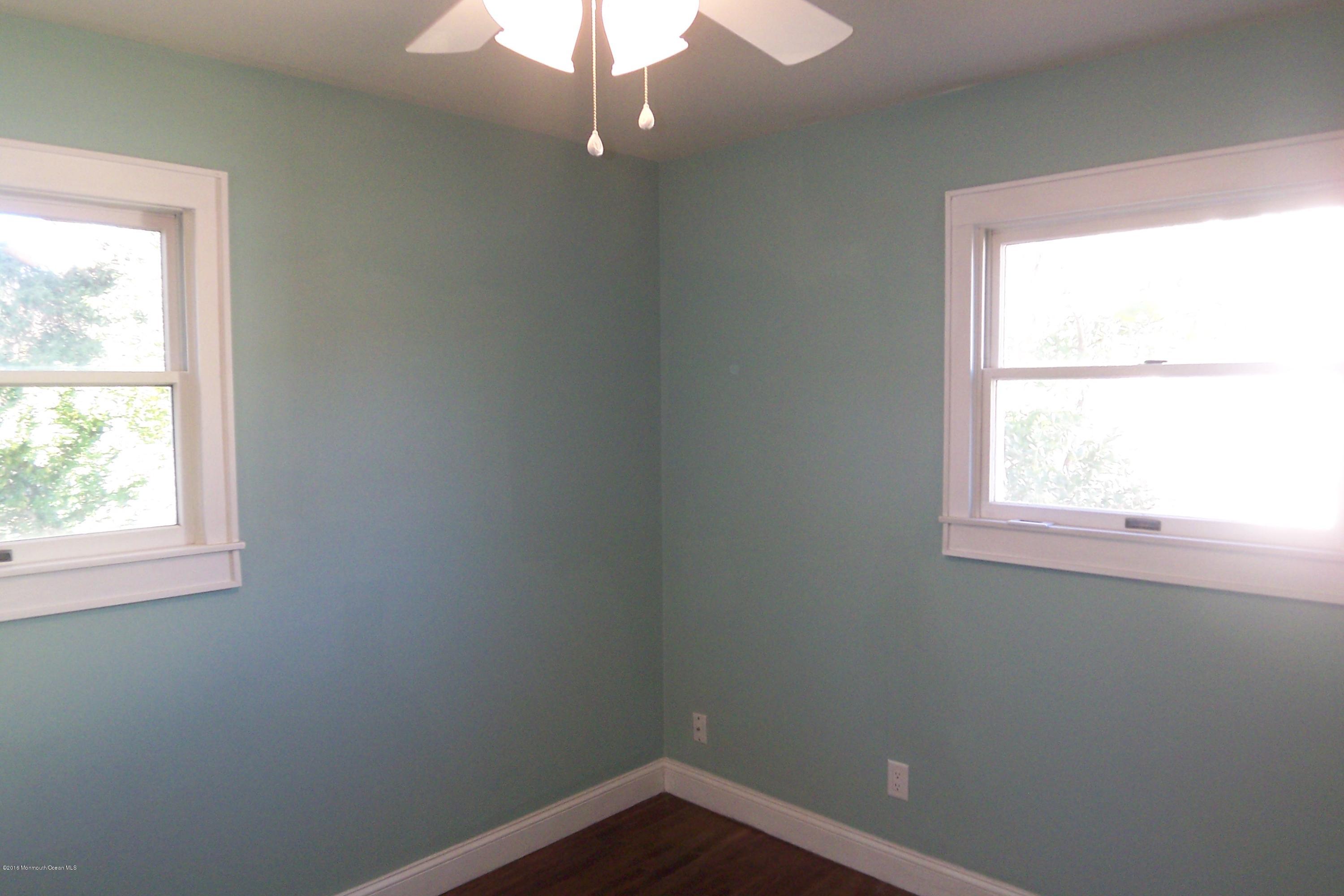 119 Meadowbrook Road Spring Lake Heights, NJ 07762 - Photo 15 of 24 an empty room with a window