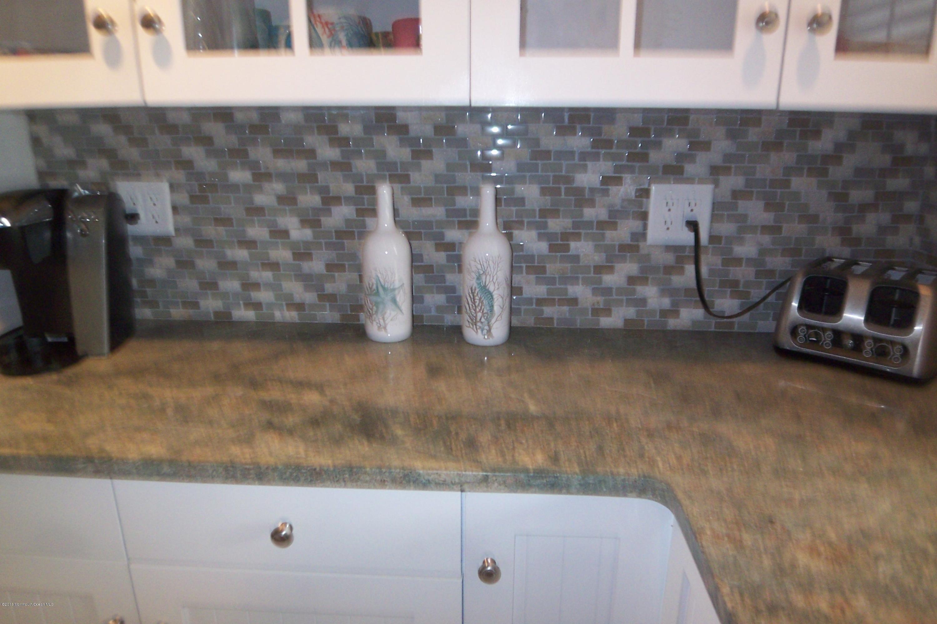 119 Meadowbrook Road Spring Lake Heights, NJ 07762 - Photo 6 of 24 a view of a fireplace