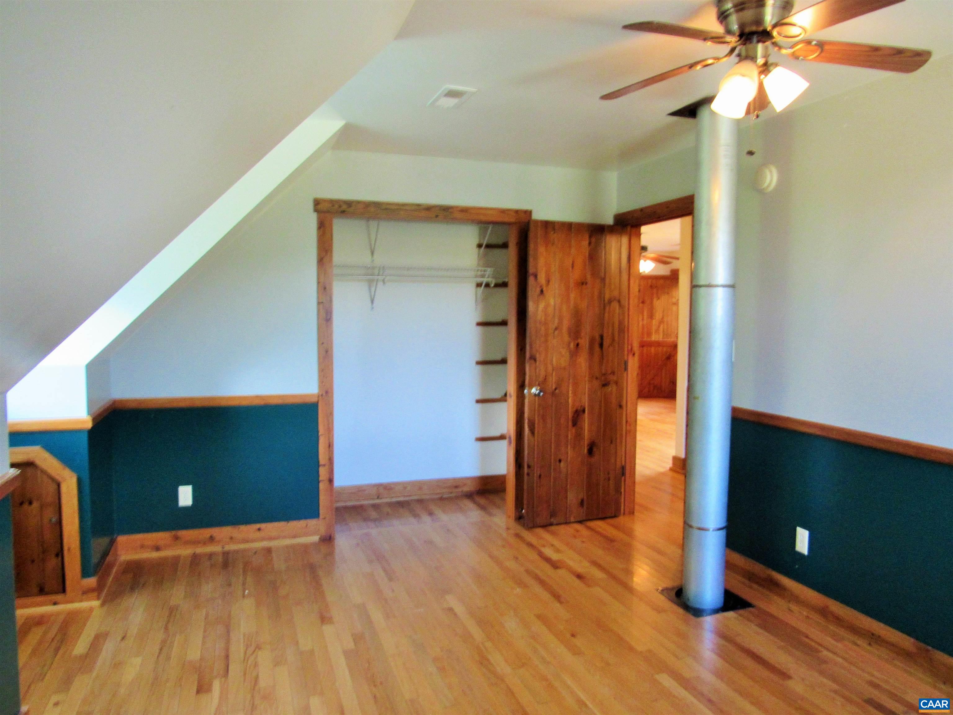 611 Hartless Road Amherst, VA 24521 - Photo 31 of 51 a view of empty room with wooden floor