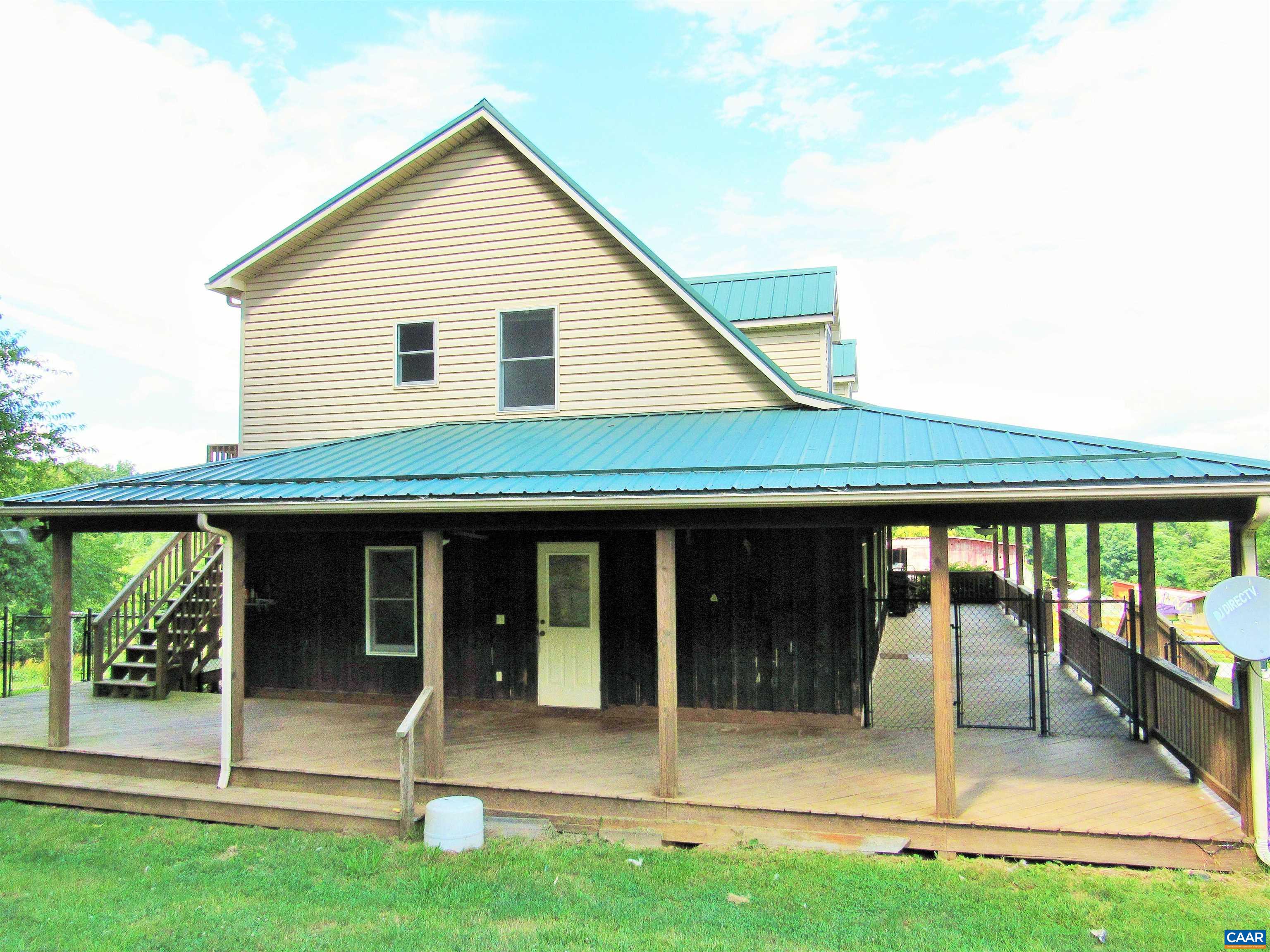 611 Hartless Road Amherst, VA 24521 - Photo 4 of 51 a view of a house with backyard porch and garden