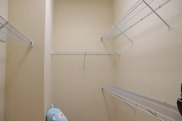 a view of small space with racks on the wall