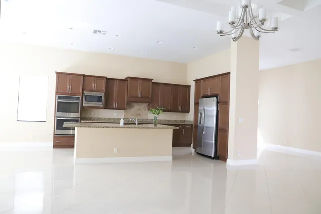 a view of empty room with windows