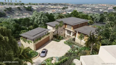 an aerial view of a house with yard