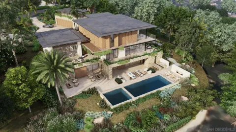 an aerial view of a house with balcony and outdoor space