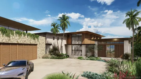 a front view of a house with a yard and potted plants