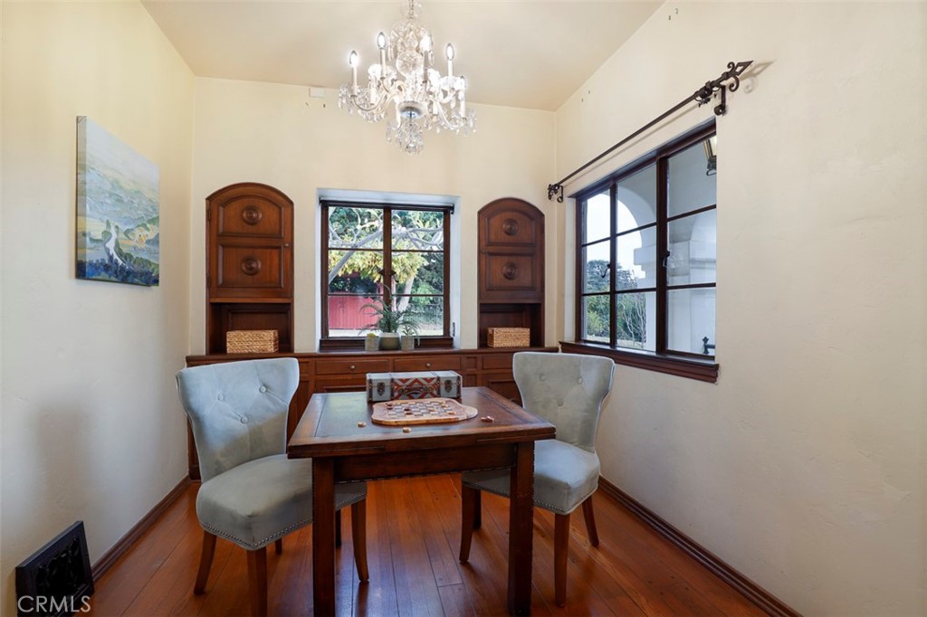 5818 Painter Avenue Whittier, CA 90601 - Photo 18 of 53 a view of a dining room with furniture window and wooden floor