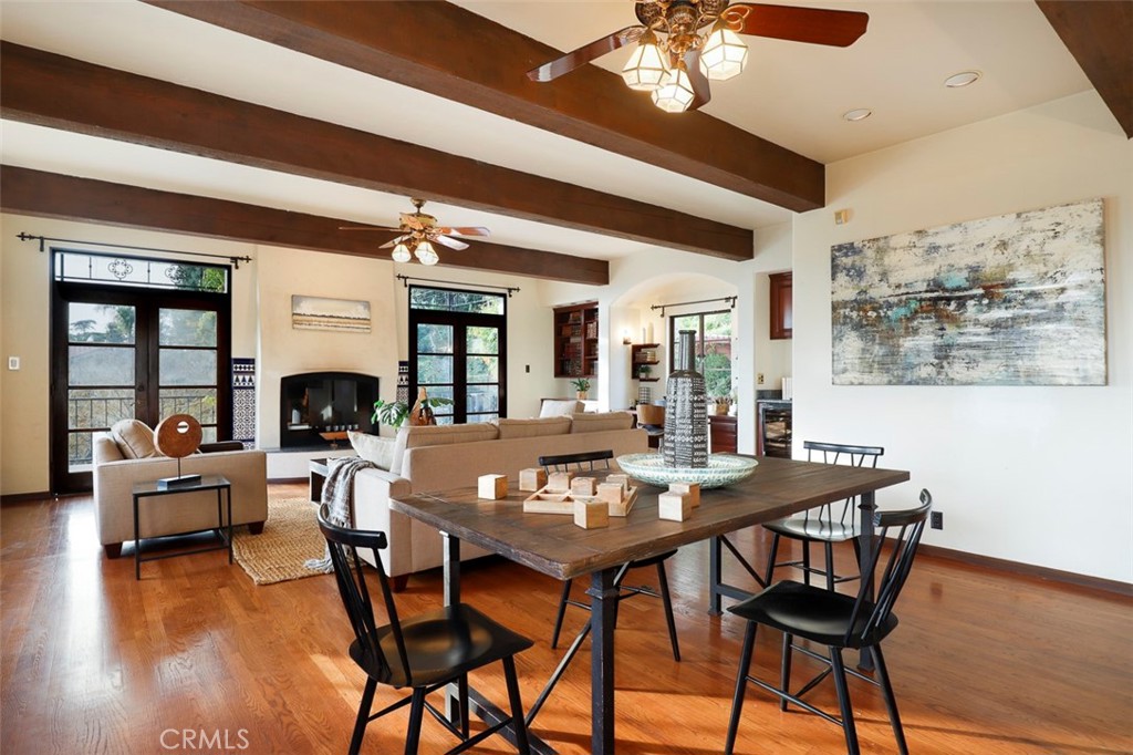 5818 Painter Avenue Whittier, CA 90601 - Photo 25 of 53 a view of a dining room with furniture wooden floor and chandelier