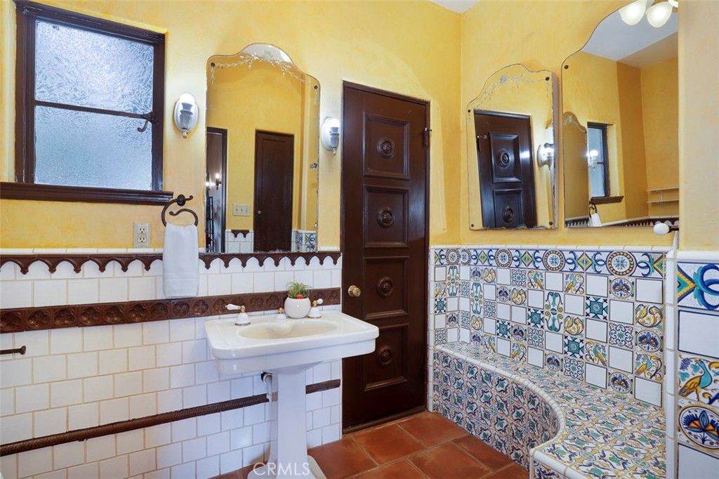 5818 Painter Avenue Whittier, CA 90601 - Photo 35 of 53 a bathroom with a sink and a mirror