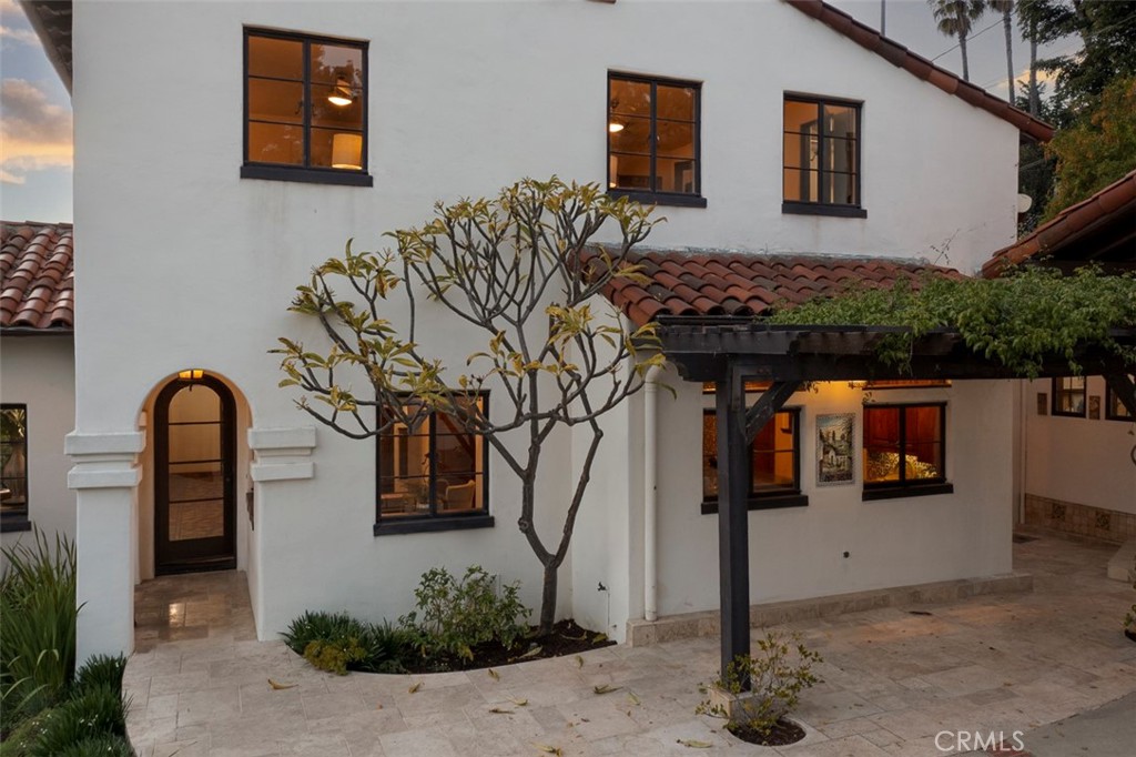 5818 Painter Avenue Whittier, CA 90601 - Photo 5 of 53 a front view of a house with lots of trees
