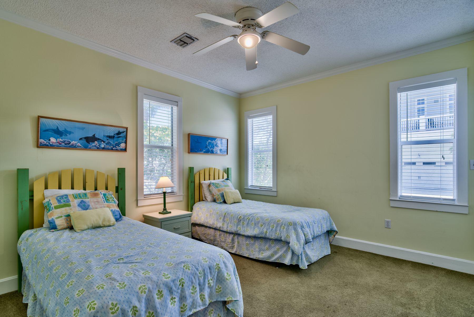 474 Old Beach Road Santa Rosa Beach, FL 32459 - Photo 11 of 24 a bedroom with two beds and painting on the wall