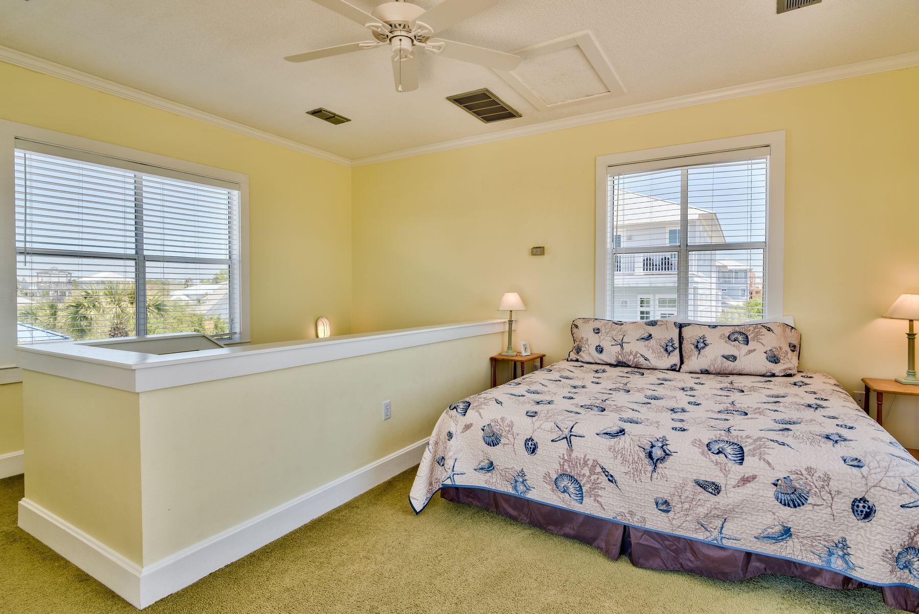 474 Old Beach Road Santa Rosa Beach, FL 32459 - Photo 12 of 24 a bedroom with a bed and a window
