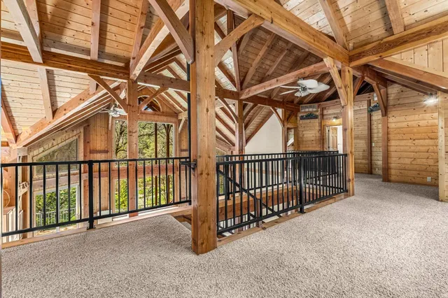a view of entryway and hall with dining room