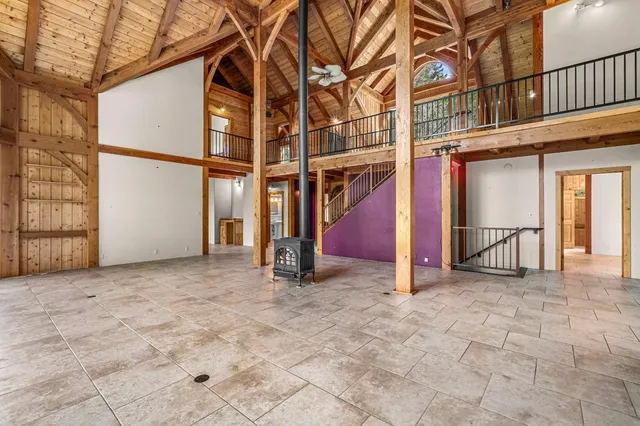 a kitchen with stainless steel appliances granite countertop a stove and a refrigerator