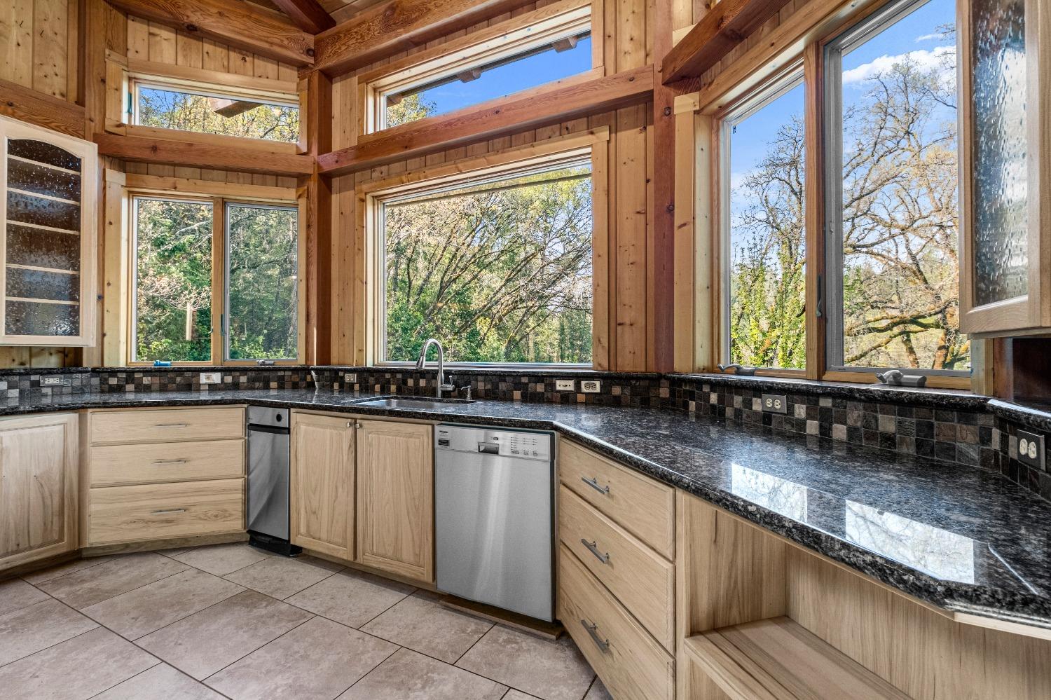 4271 Marshall Road Georgetown, CA 95634 - Photo 31 of 70 a kitchen with a sink and a large window