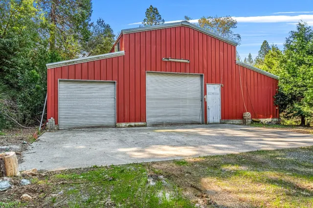 a kitchen with stainless steel appliances a stove and a sink