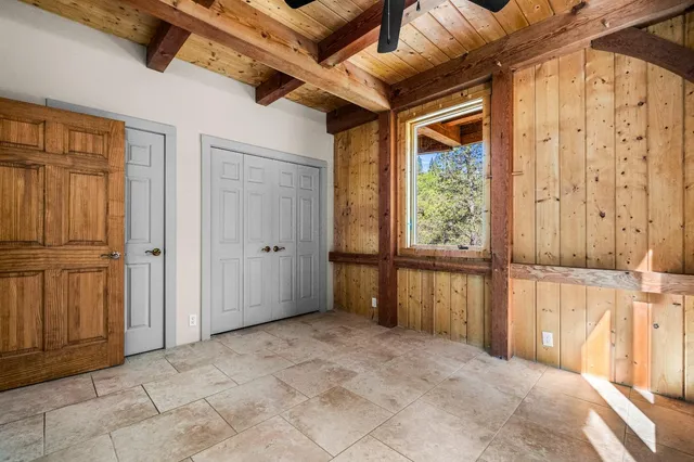 a view of a balcony with wooden floor