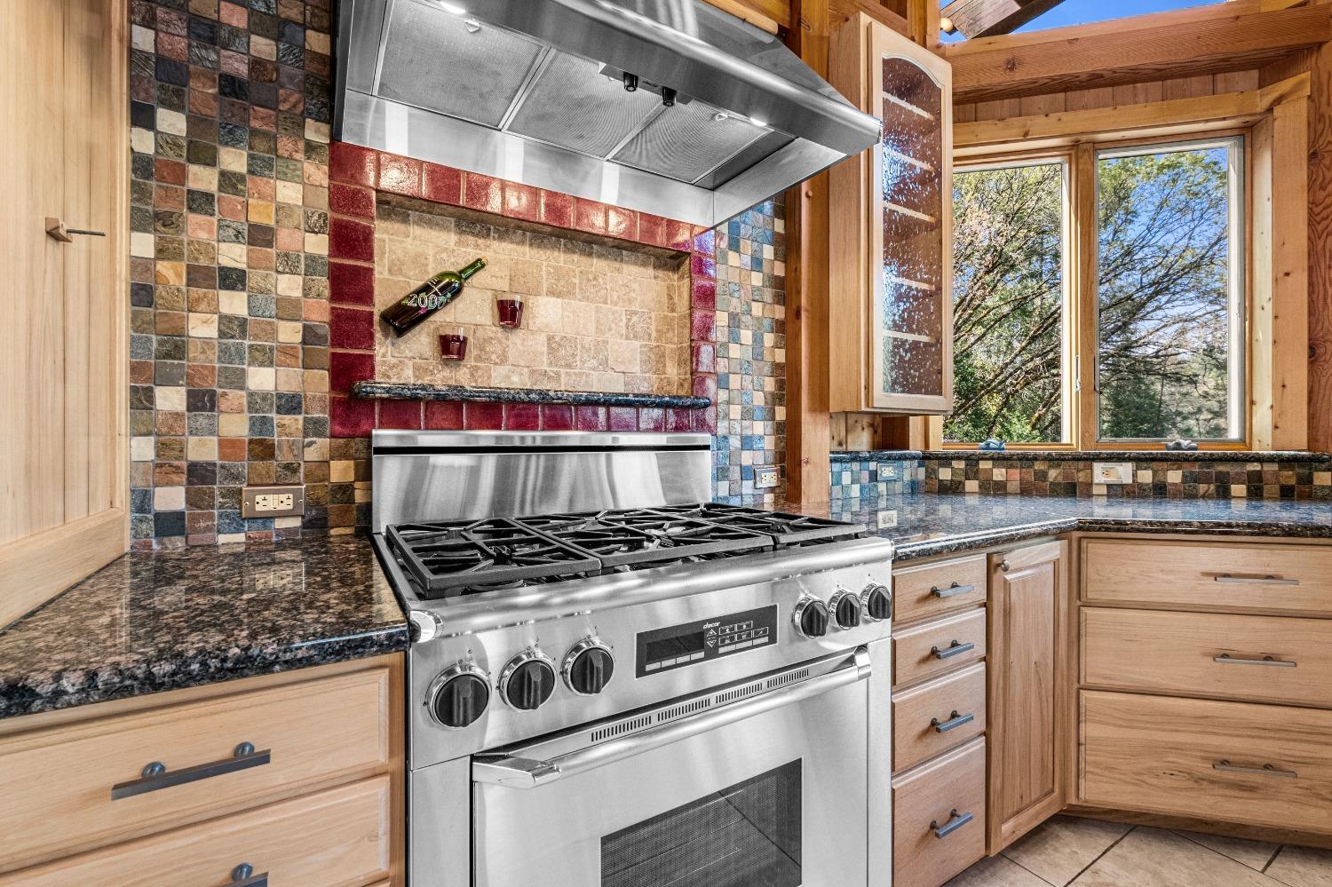 4271 Marshall Road Georgetown, CA 95634 - Photo 7 of 70 a kitchen with stainless steel appliances granite countertop a stove and a sink