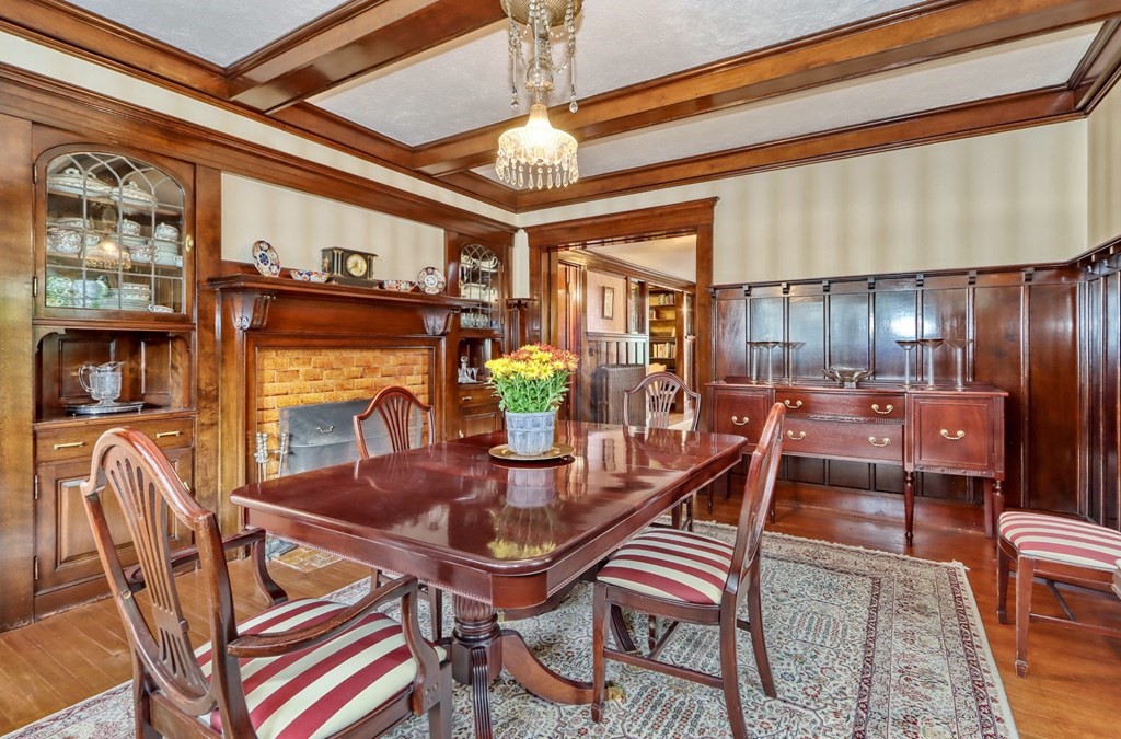 3 Sheffield Road Winchester, MA 01890 - Photo 14 of 42 a dining room with furniture a rug and wooden floor
