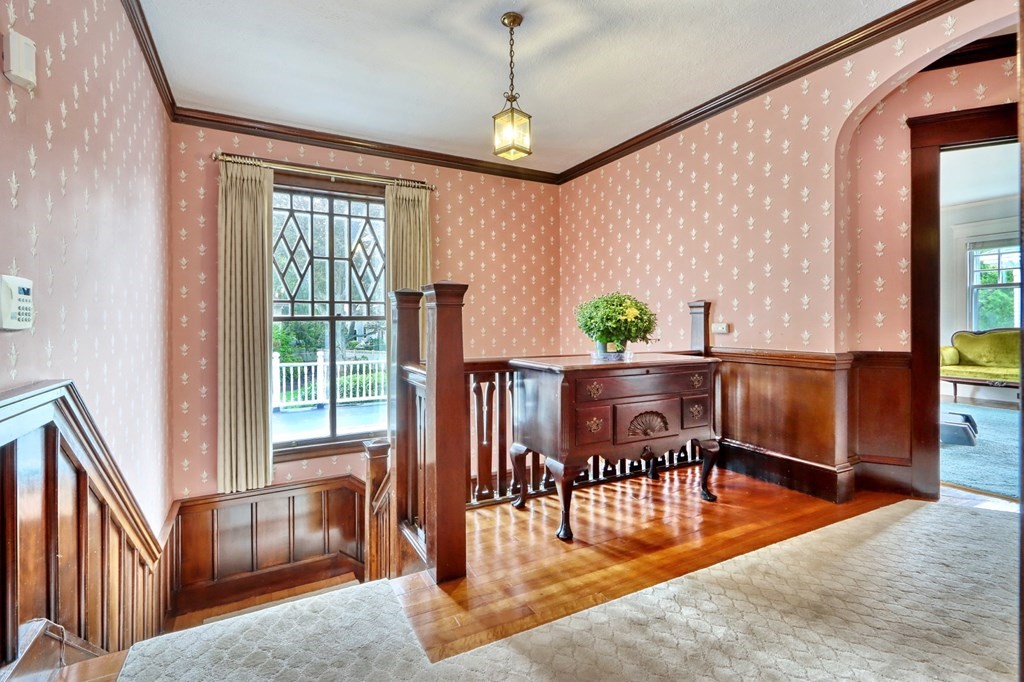 3 Sheffield Road Winchester, MA 01890 - Photo 21 of 42 a living room with furniture and a window
