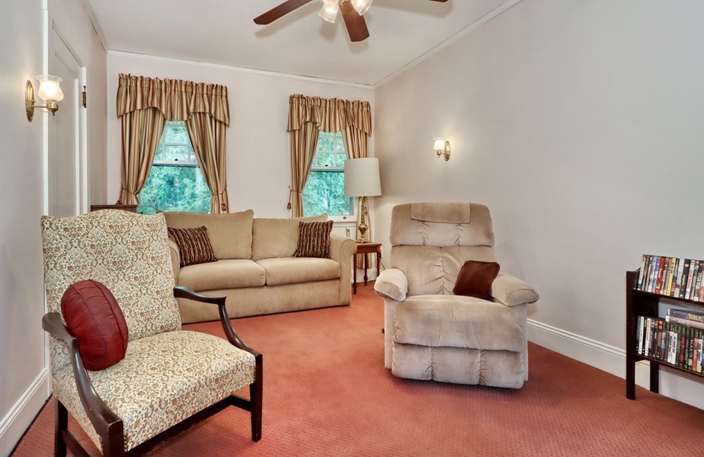 3 Sheffield Road Winchester, MA 01890 - Photo 22 of 42 a living room with furniture and a large window