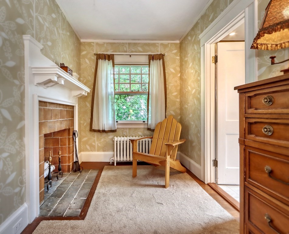 3 Sheffield Road Winchester, MA 01890 - Photo 26 of 42 a view of a bedroom with furniture and a window