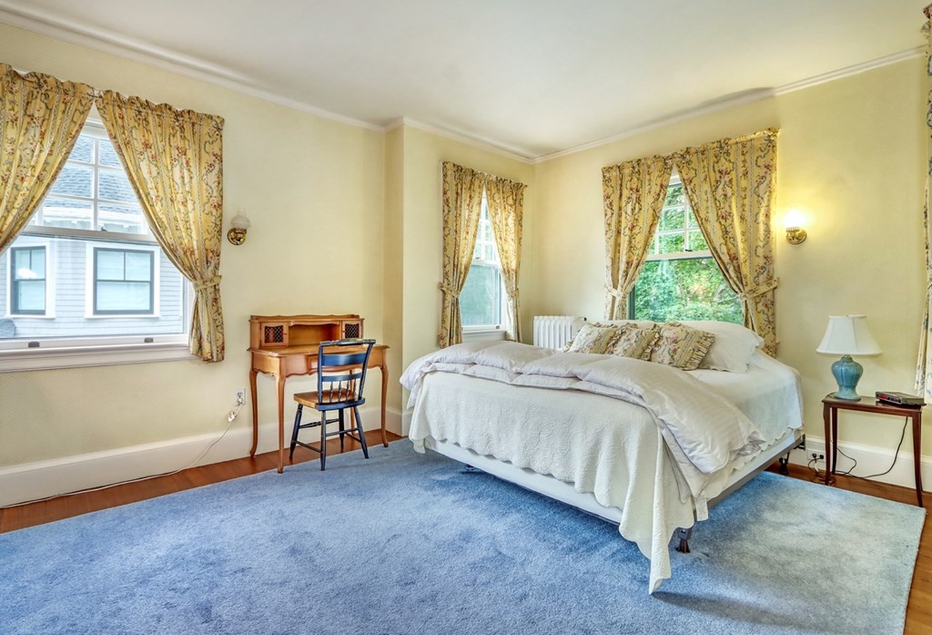 3 Sheffield Road Winchester, MA 01890 - Photo 31 of 42 a spacious bedroom with a bed and a window