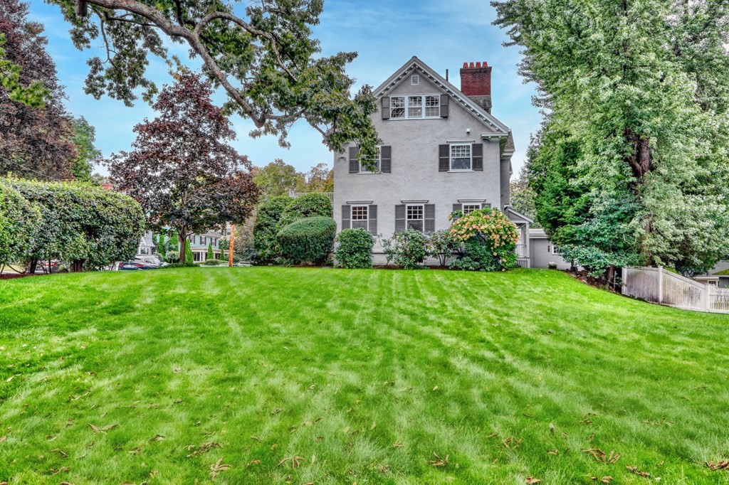 3 Sheffield Road Winchester, MA 01890 - Photo 40 of 42 a front view of house with yard and green space