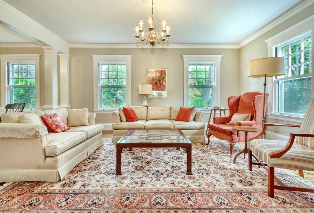 3 Sheffield Road Winchester, MA 01890 - Photo 7 of 42 a living room with furniture and a chandelier
