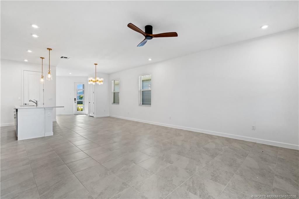 9731 Southwest Indra Way Port St. Lucie, FL 34987 - Photo 12 of 33 Living Room