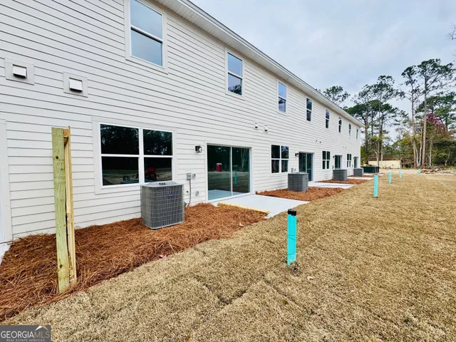 a house view with a backyard space