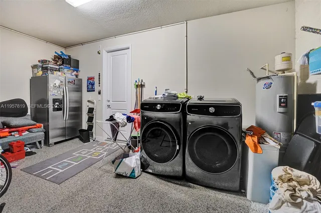 a view of backyard with swimming pool and outdoor seating