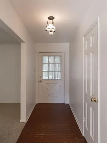 a view of entryway with front door