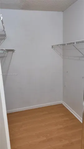 a view of a room with racks on the wall