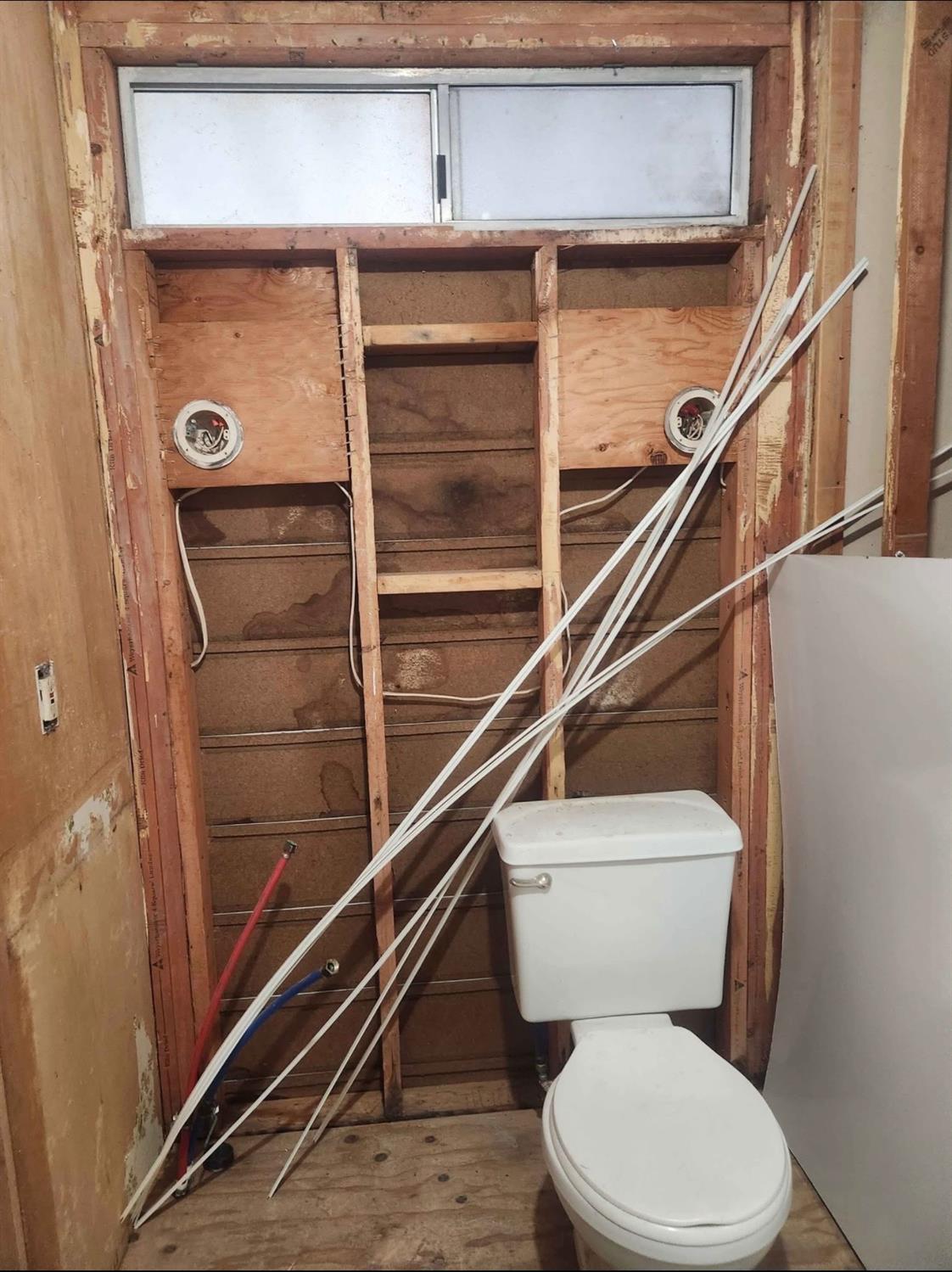 2809 North Buhach Road, Unit 89 Atwater, CA 95301 - Photo 6 of 6 a white toilet sitting next to a bathroom