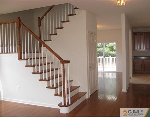 626 Myrtle Road North Brunswick, NJ 08902 - Photo 3 of 9 a view of entryway and hall with wooden floor