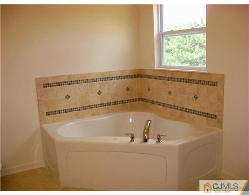 626 Myrtle Road North Brunswick, NJ 08902 - Photo 8 of 9 a bathroom with a tub