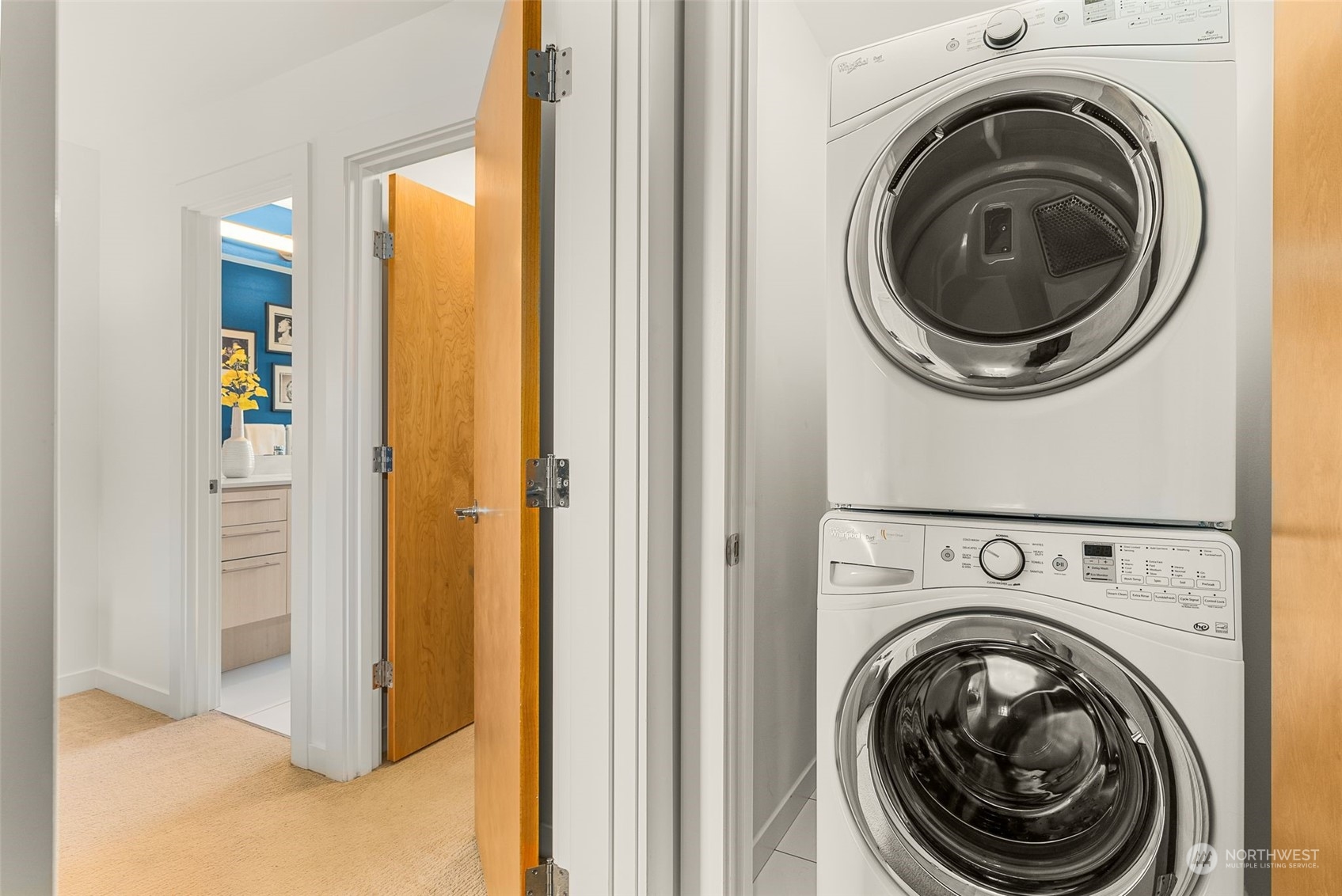 3909 Southwest Findlay Street Seattle, WA 98136 - Photo 20 of 32 a view of a hallway with washer and dryer