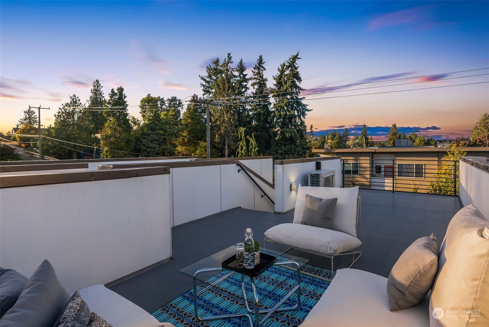 3909 Southwest Findlay Street Seattle, WA 98136 - Photo 2 of 32 a view of a balcony with chairs and a potted plant