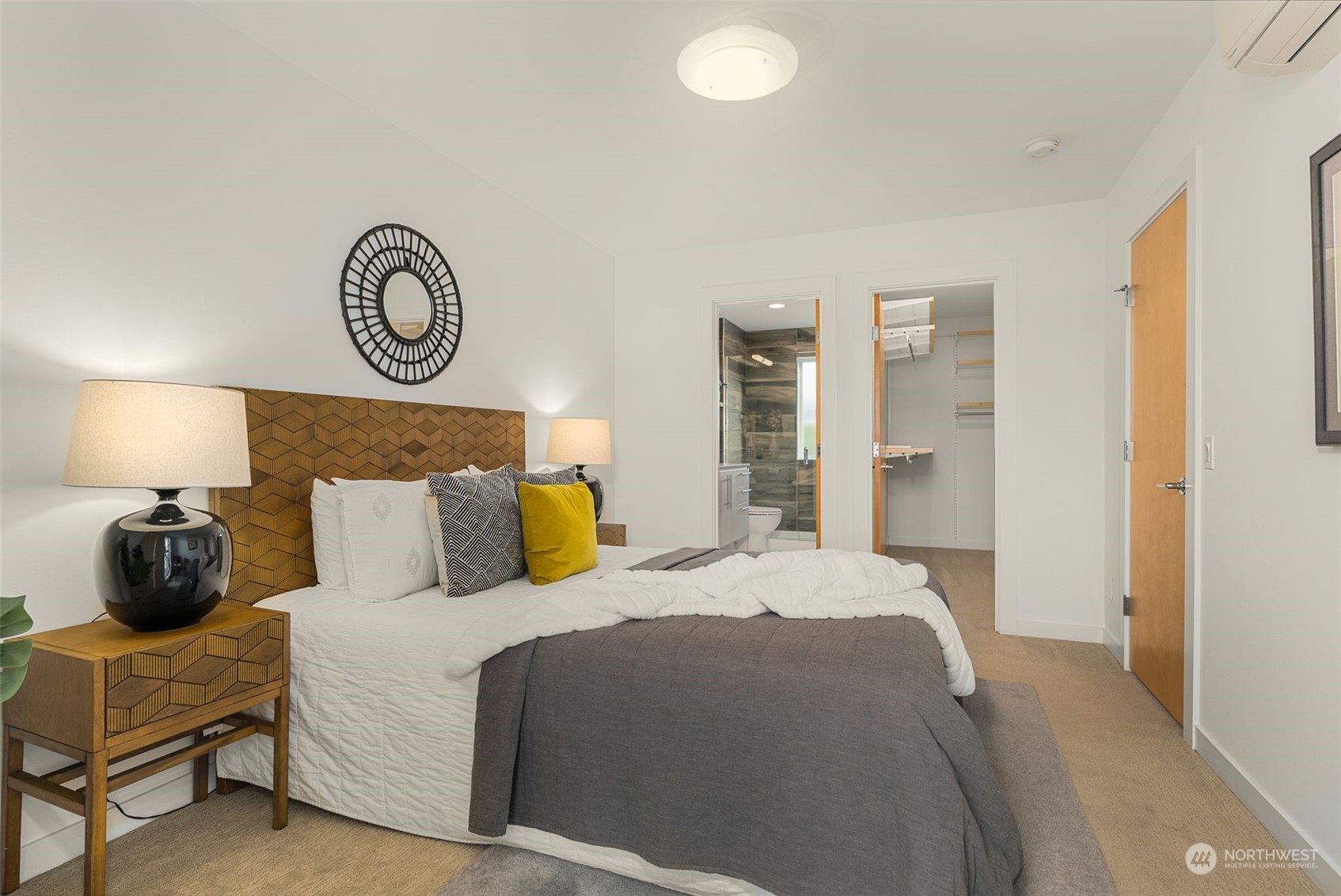 3909 Southwest Findlay Street Seattle, WA 98136 - Photo 21 of 32 a bedroom with a bed and wooden floor