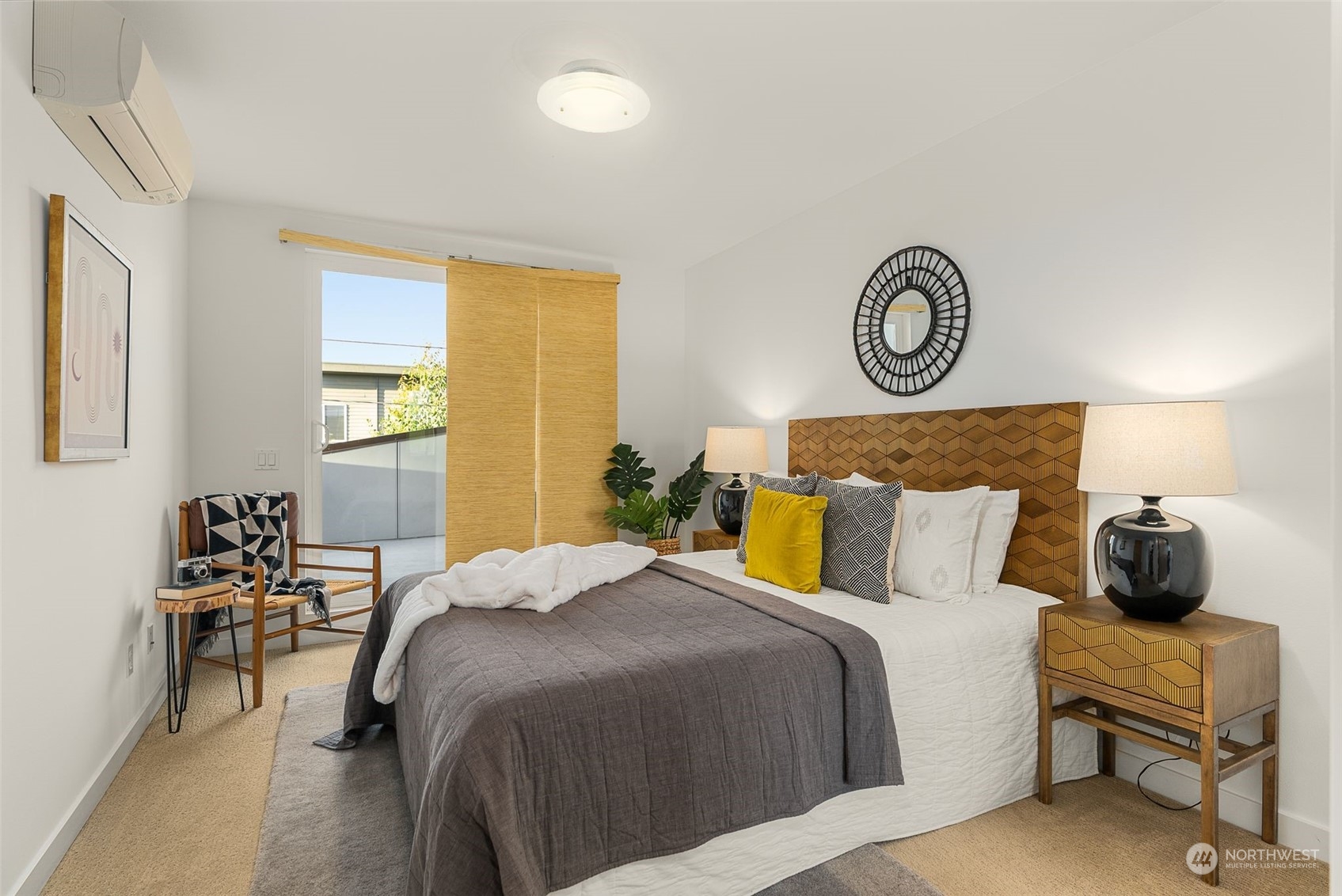 3909 Southwest Findlay Street Seattle, WA 98136 - Photo 22 of 32 a bedroom with a bed and chair