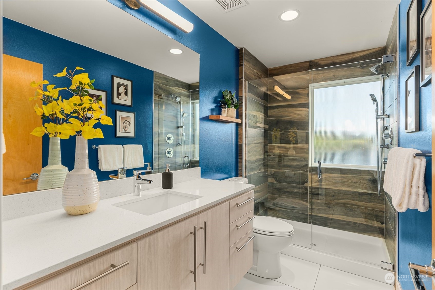 3909 Southwest Findlay Street Seattle, WA 98136 - Photo 24 of 32 a bathroom with a sink a toilet and shower