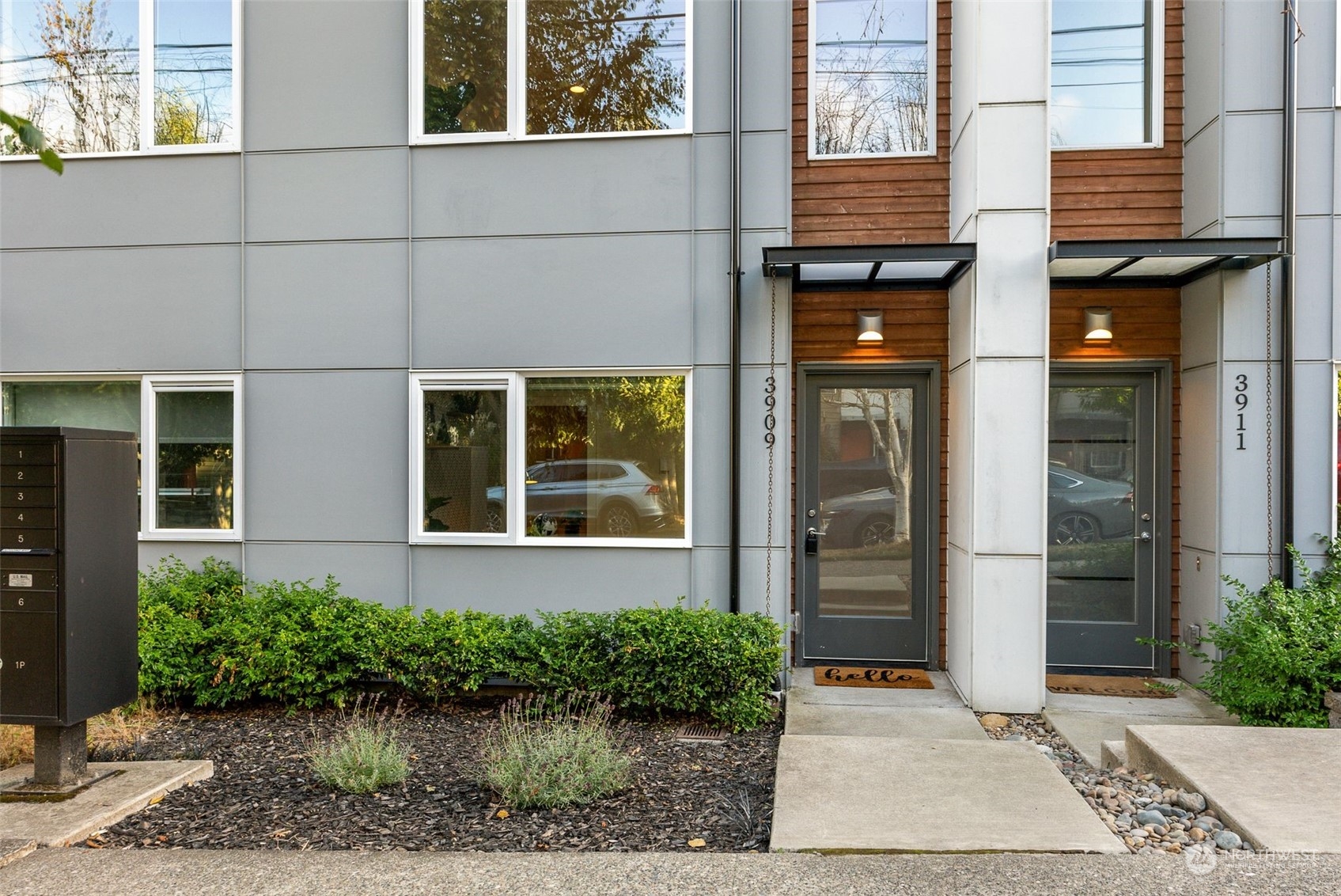 3909 Southwest Findlay Street Seattle, WA 98136 - Photo 3 of 32 a front view of a house with garden