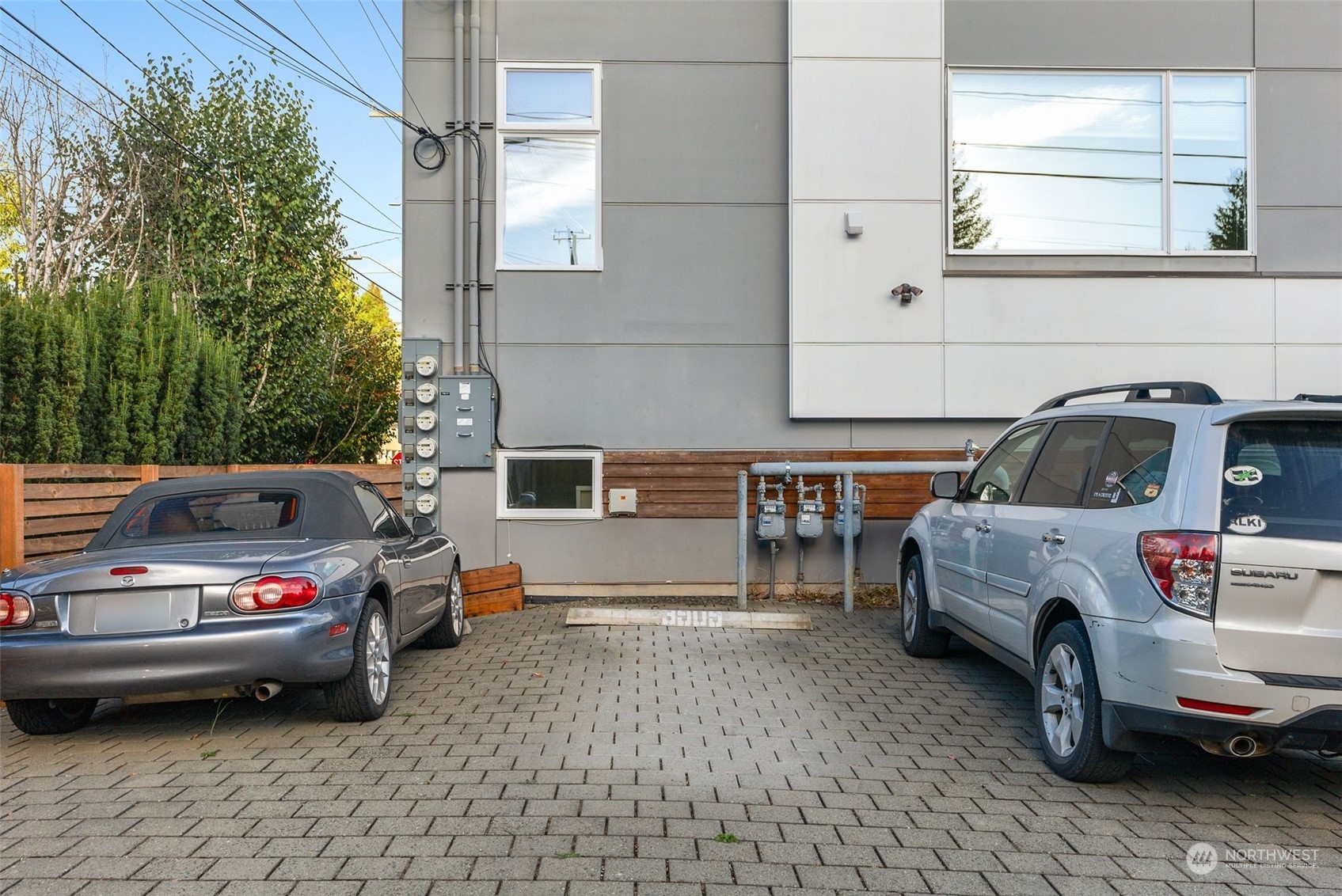 3909 Southwest Findlay Street Seattle, WA 98136 - Photo 32 of 32 a front view of a house with parking space