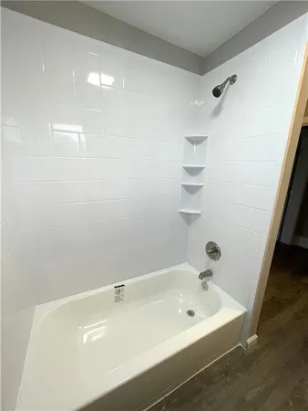 a bathroom with a bathtub