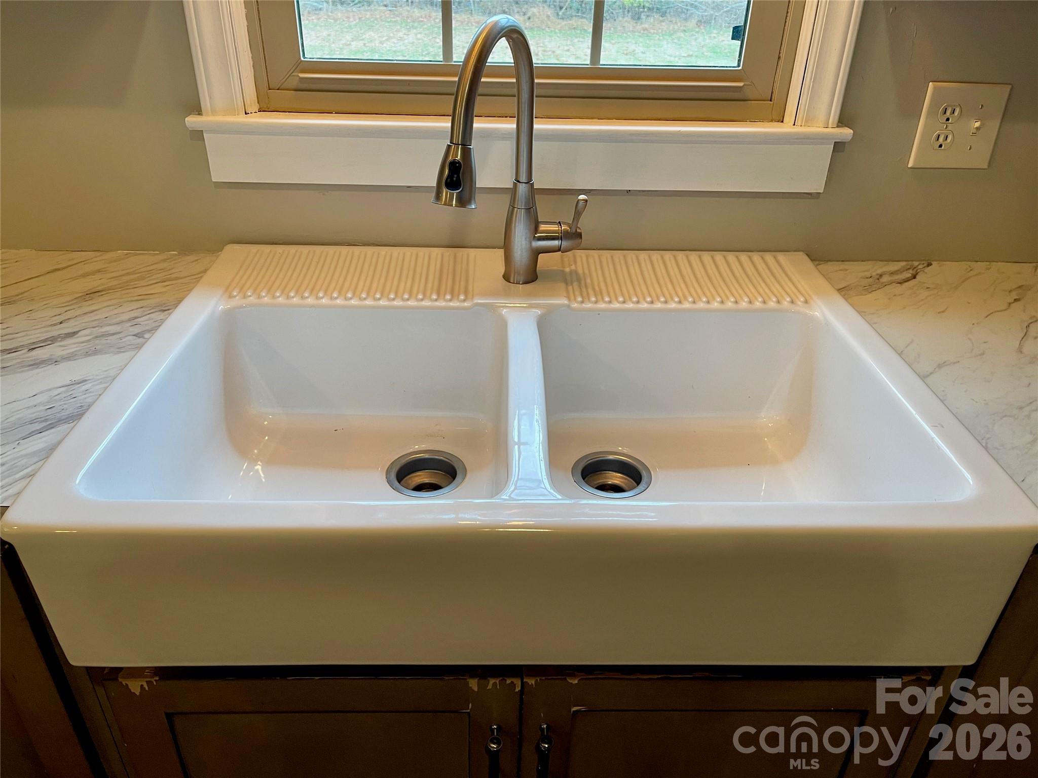 635 Powell Road Northeast Lenoir, NC 28645 - Photo 15 of 48 a bathroom with a sink