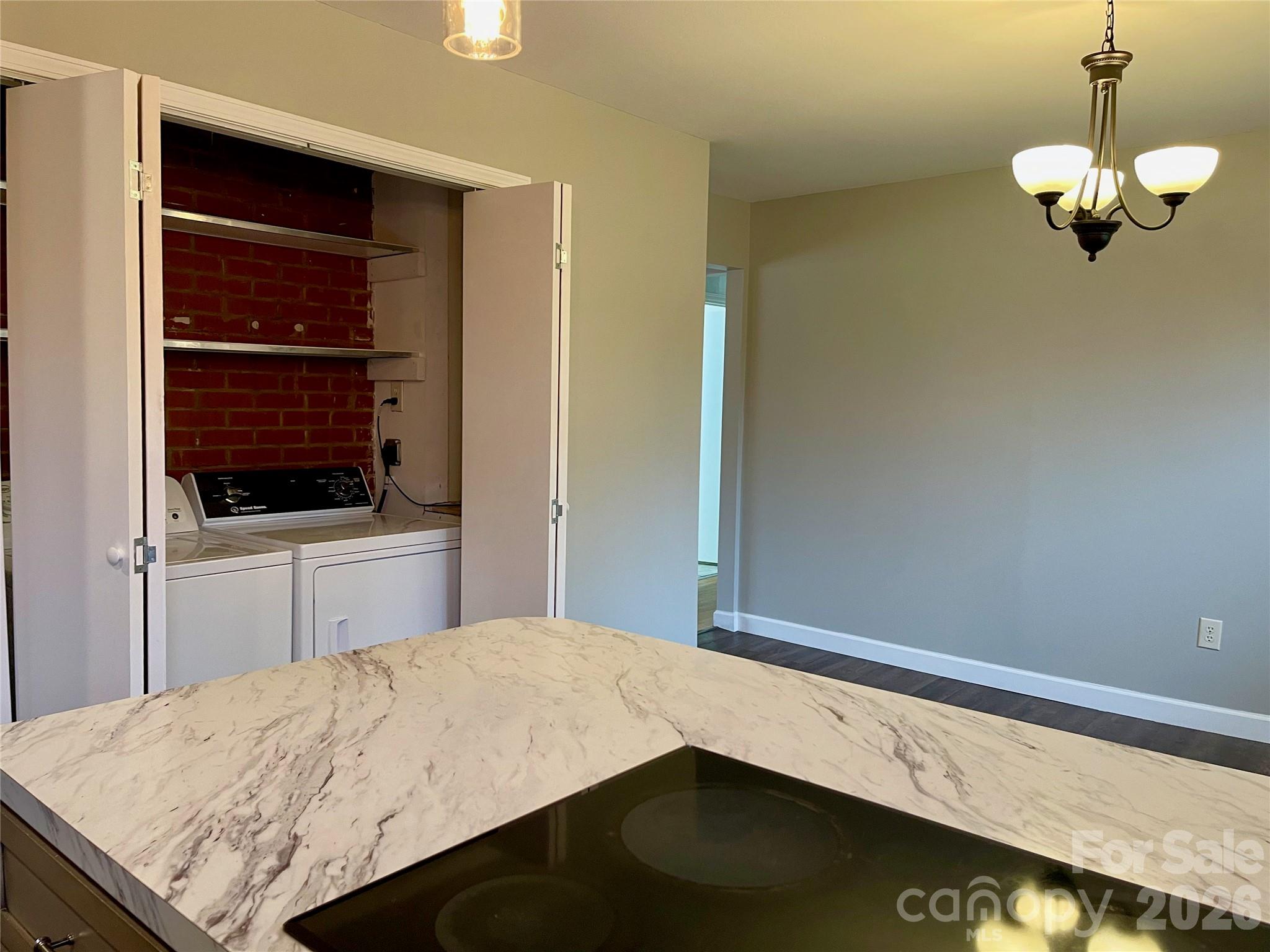 635 Powell Road Northeast Lenoir, NC 28645 - Photo 17 of 48 a view of a kitchen from the hallway
