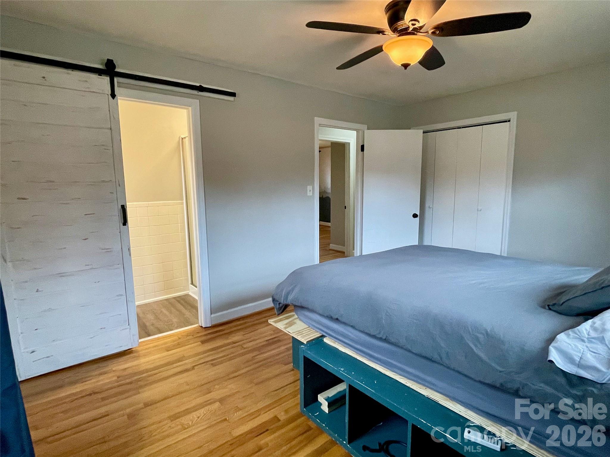 635 Powell Road Northeast Lenoir, NC 28645 - Photo 28 of 48 a bedroom with a bed and a window