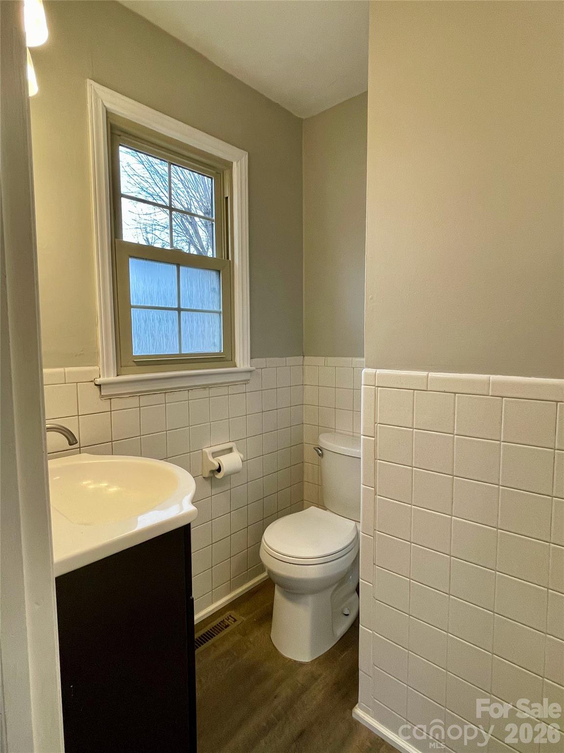 635 Powell Road Northeast Lenoir, NC 28645 - Photo 30 of 48 a bathroom with a sink and a toilet
