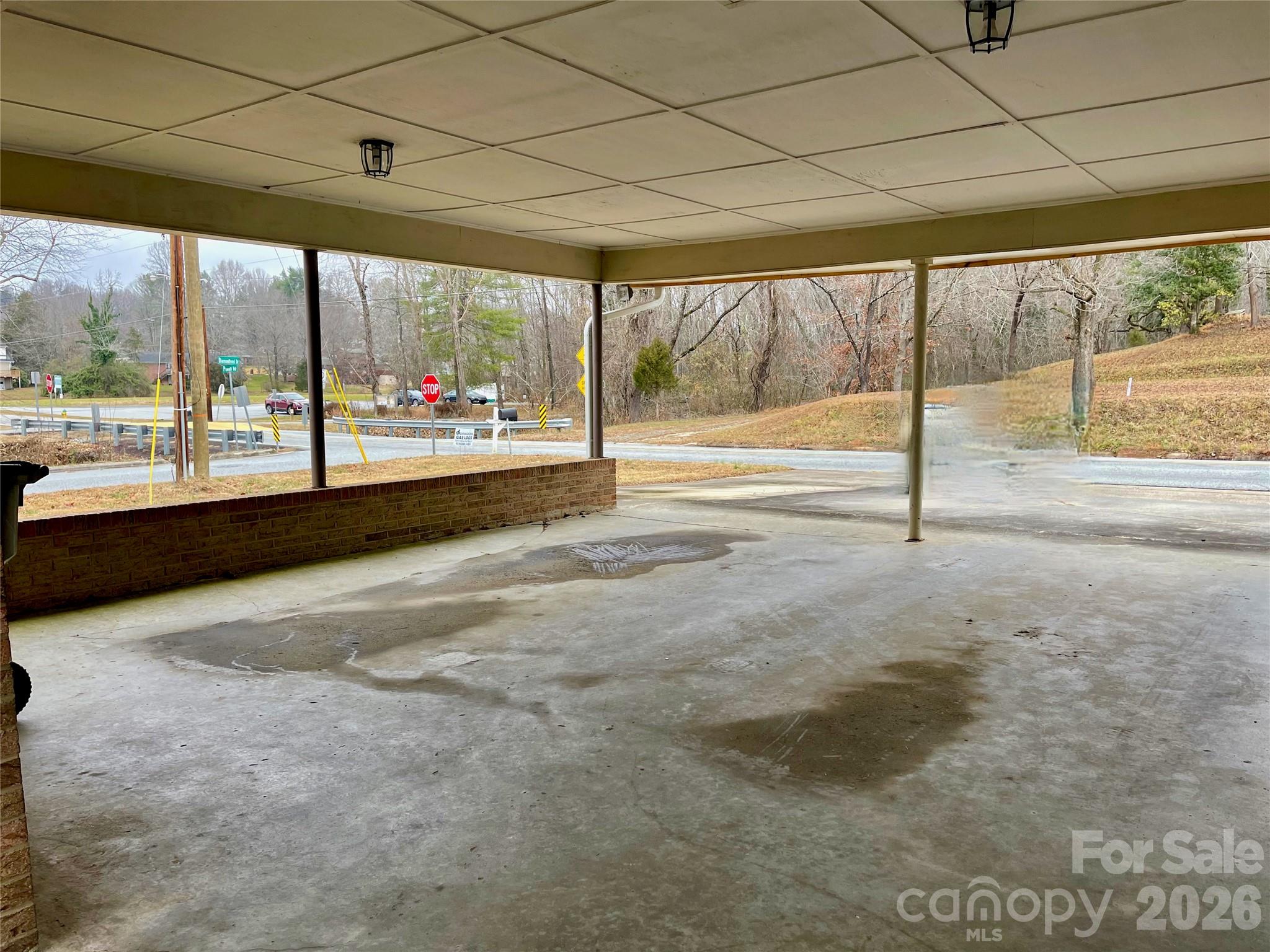 635 Powell Road Northeast Lenoir, NC 28645 - Photo 34 of 48 a view of an empty room with a large window