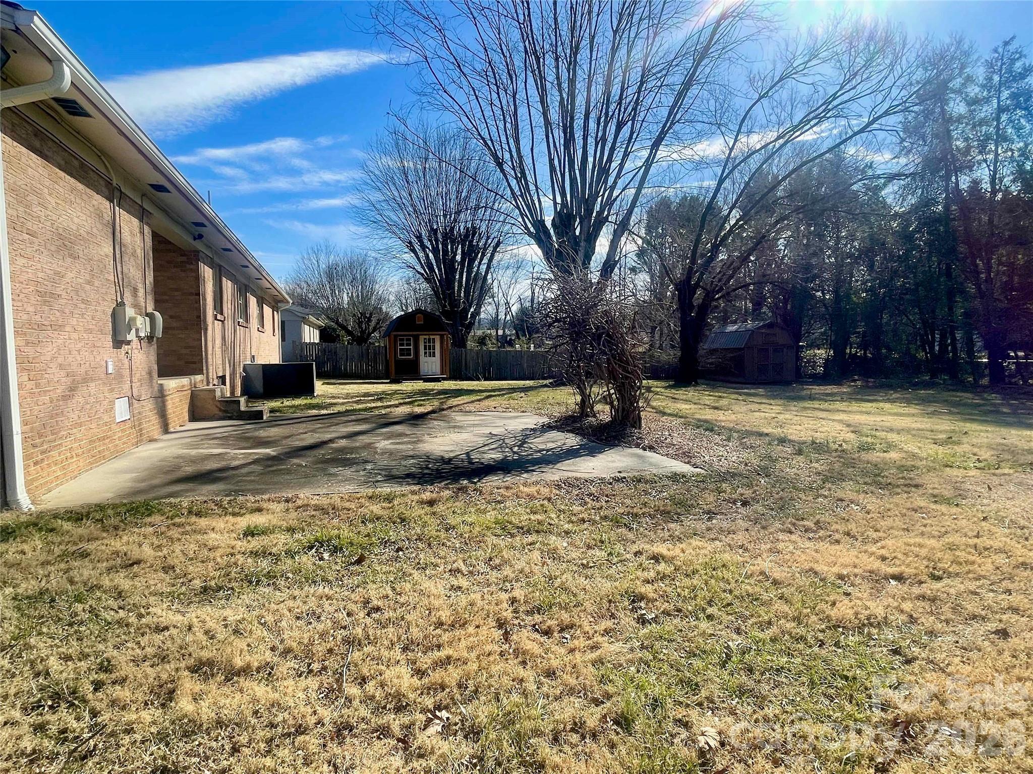 635 Powell Road Northeast Lenoir, NC 28645 - Photo 40 of 48 a view of a yard with a house